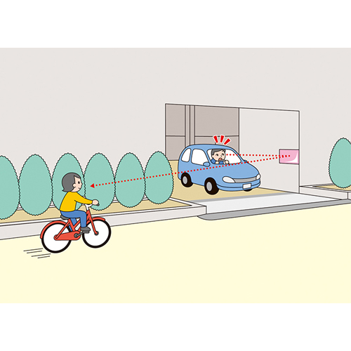 道路の死角から来る自転車を確認